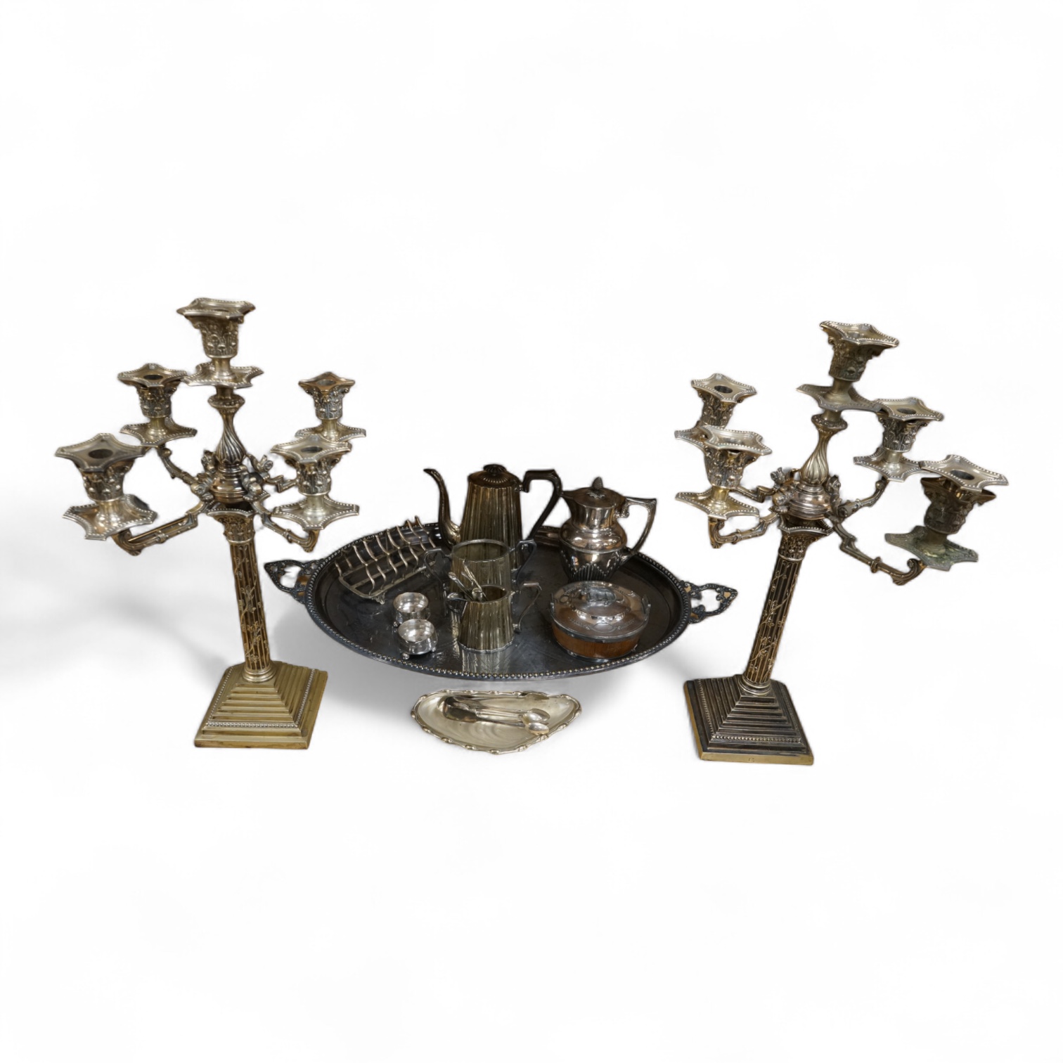 A collection of Victorian plated wares to include a pair of Corinthian column candelabra, 54cm